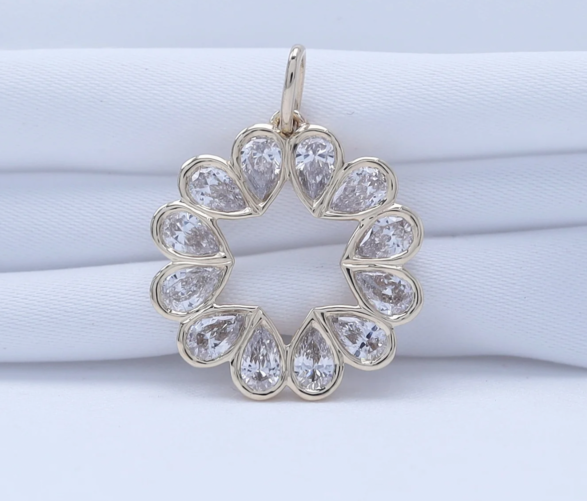14K Pear Shaped Star Outline Pendant